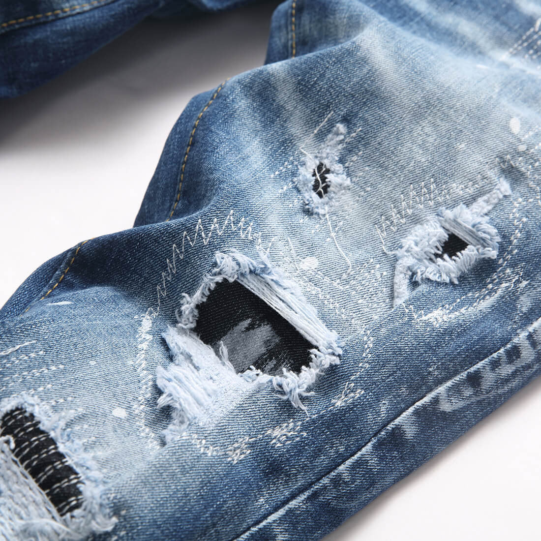 Ripped Elastic Denim Jeans