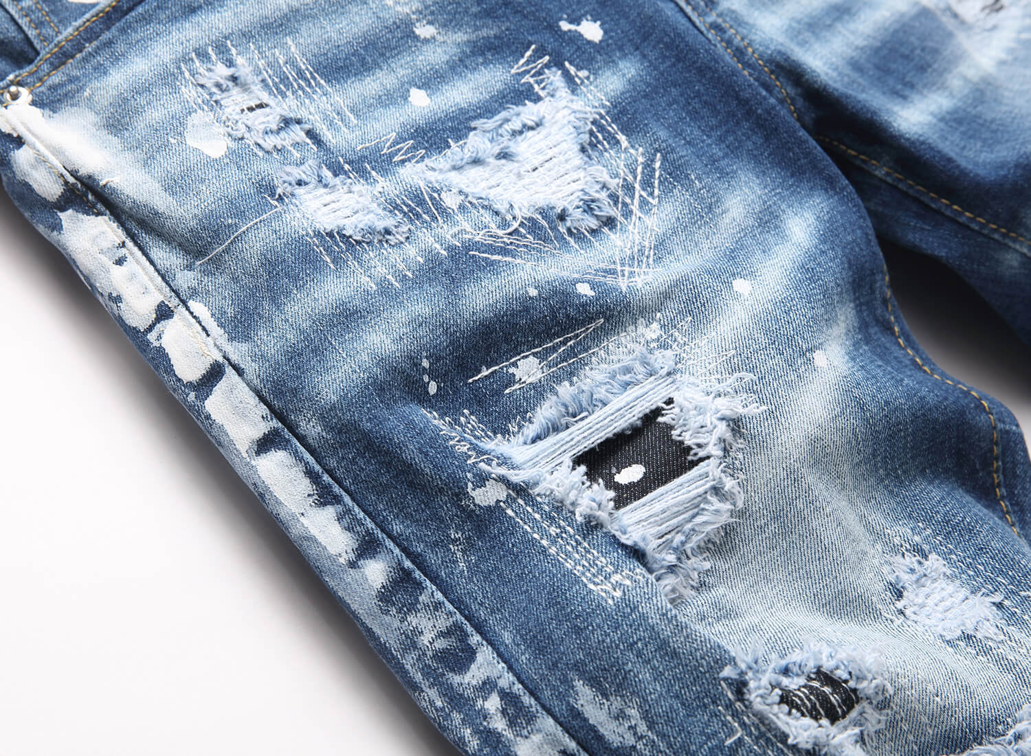Ripped Elastic Denim Jeans